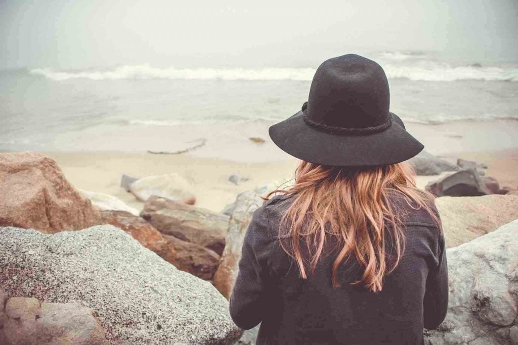 Woman looking at the beach