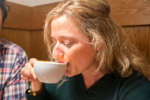 Danielle Brooker drinking coffee